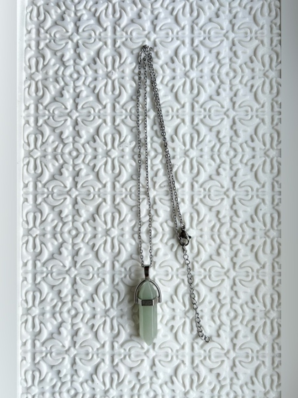 NWOT Pendant Necklace with Silver-Tone Chain and a Light Faceted Green Stone